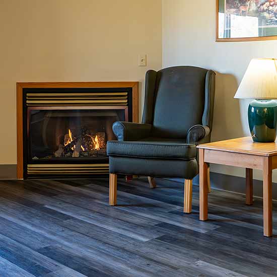 Enjoy a cozy seat by the fire